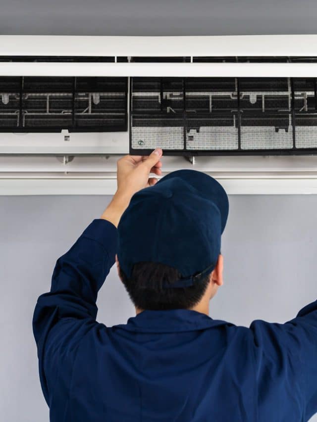 technician service removing air filter of air conditioner for cl