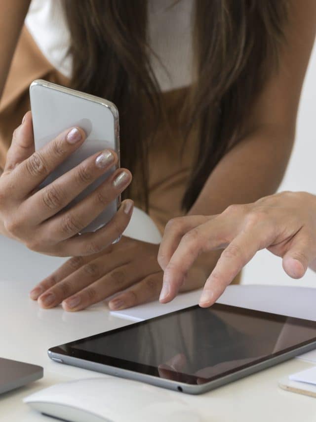 women-using-tablet-while-working