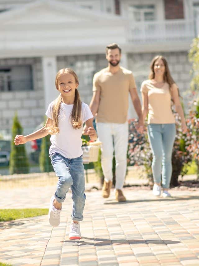 Young family going to picnic and feeling happy